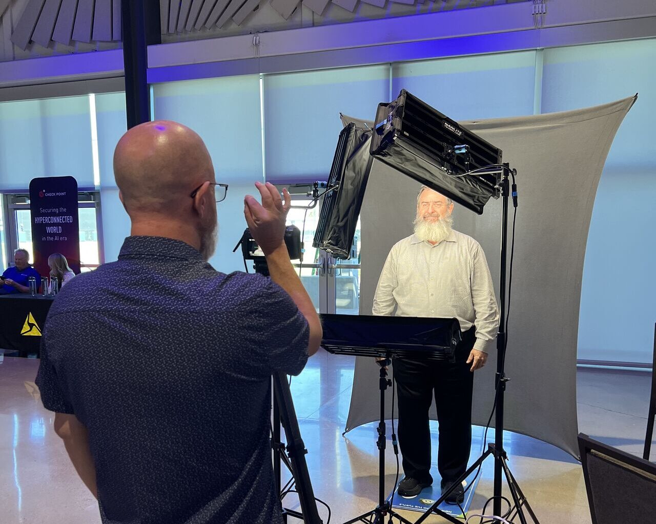 On-location corporate headshot setup Phoenix mobile studio photography