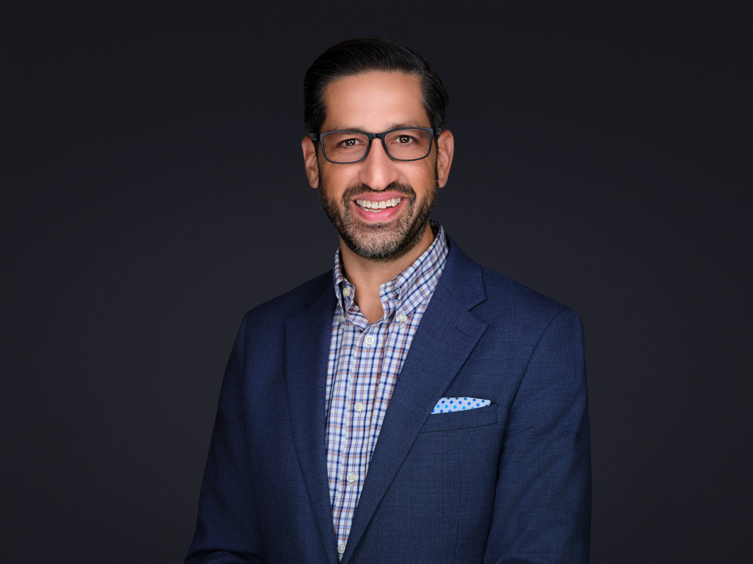 Healthcare executive portrait of a man in a dark suit, Arizona