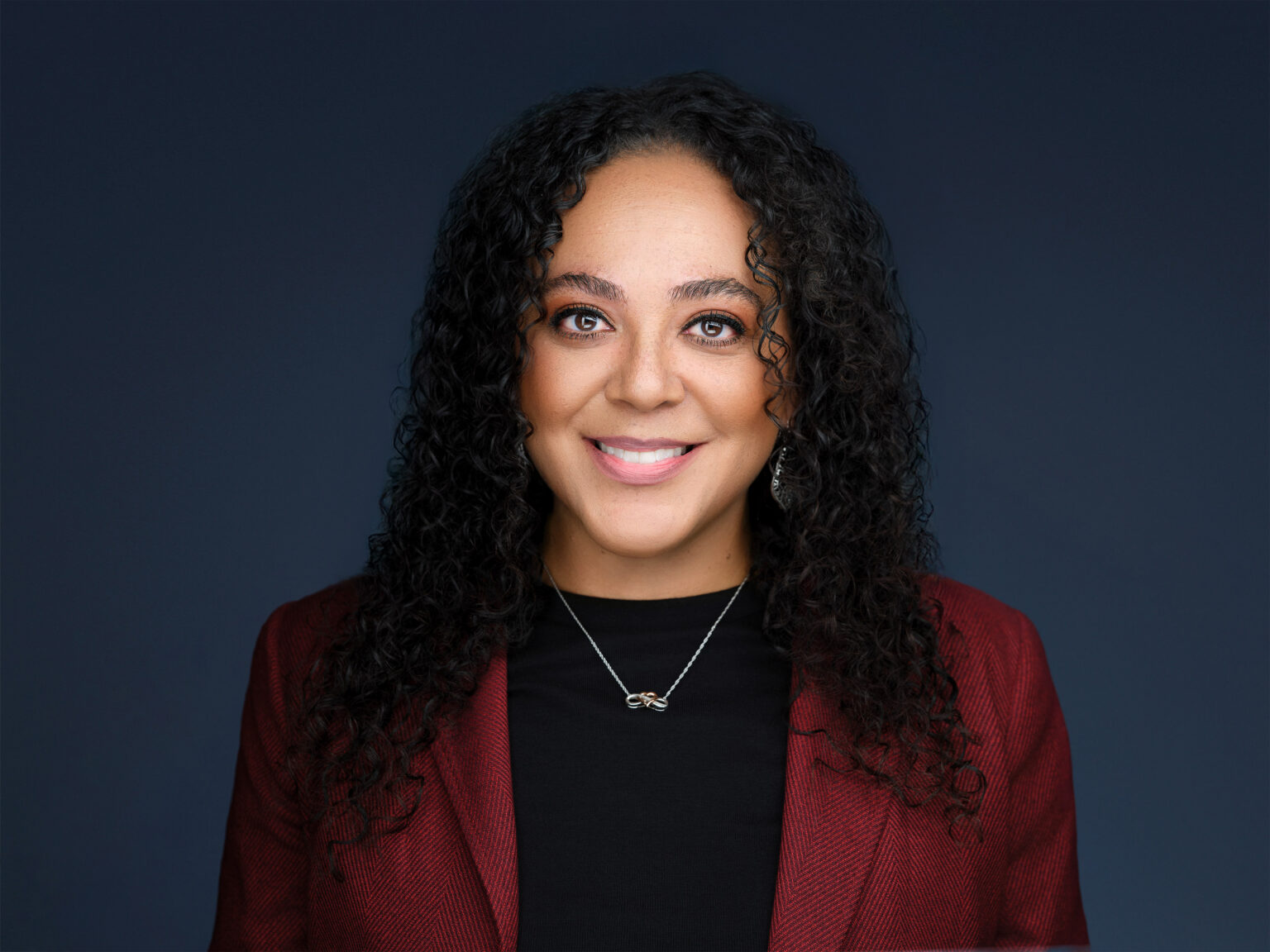 Diverse Scottsdale executive woman headshot, retouched by Duane Furlong Studios.