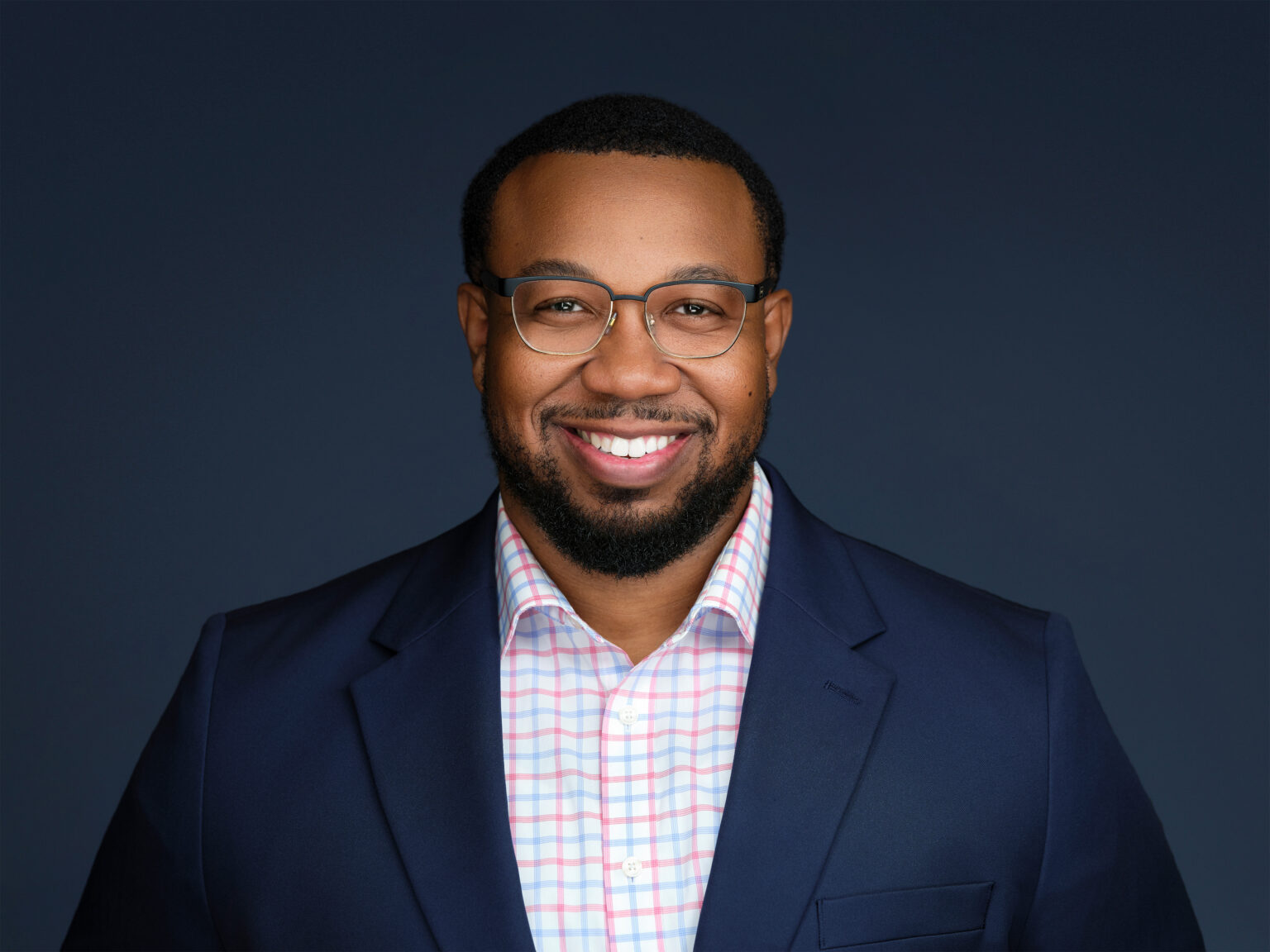 Confident male executive headshot from Scottsdale corporate team session by Duane Furlong Studios.