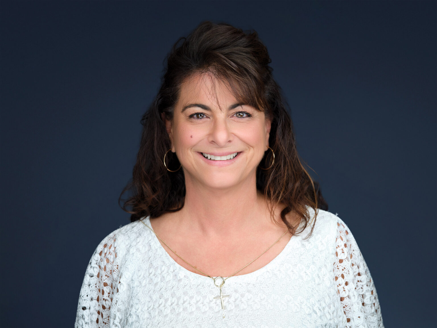 Smiling female team member headshot from Scottsdale company on-site shoot, Duane Furlong Studios