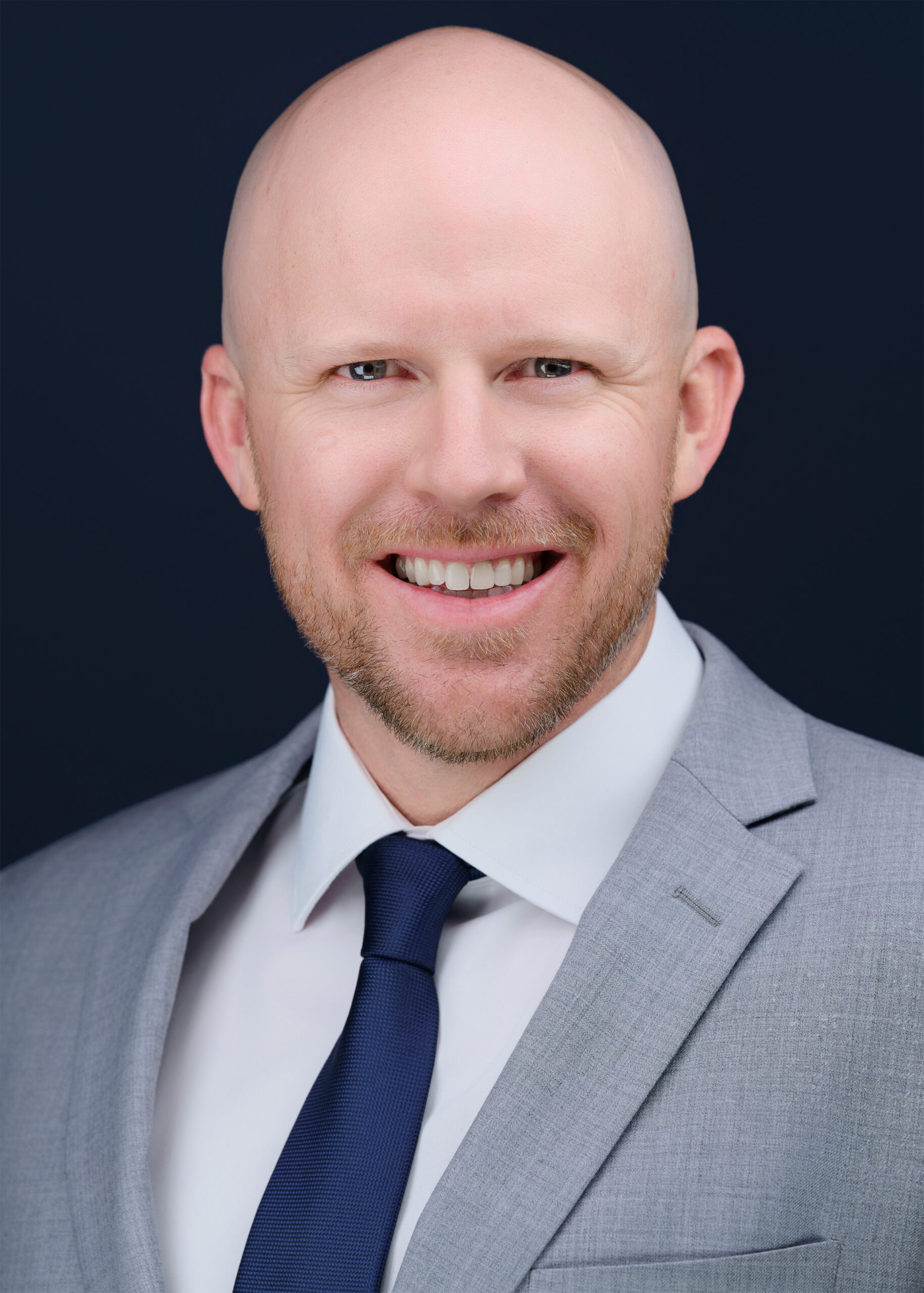 Executive headshot of a man in a black suit, Scottsdale studio