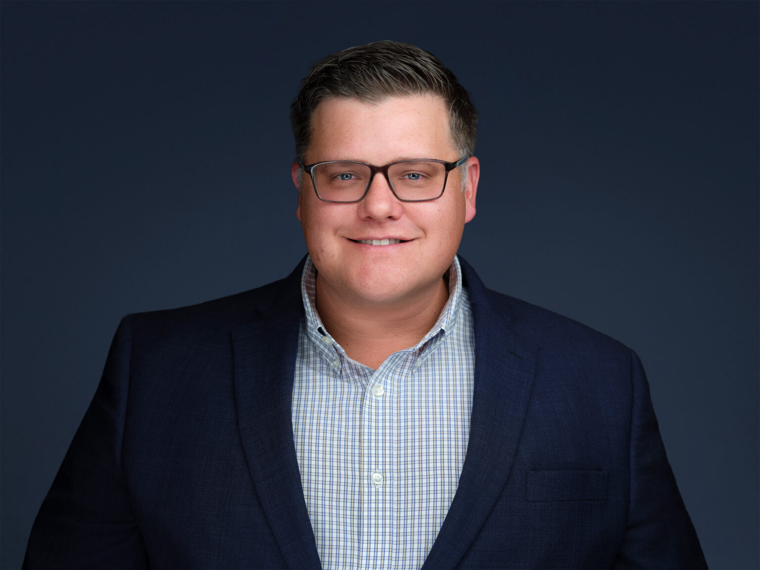 Scottsdale man in business attire headshot for exec team, Duane Furlong Studios.